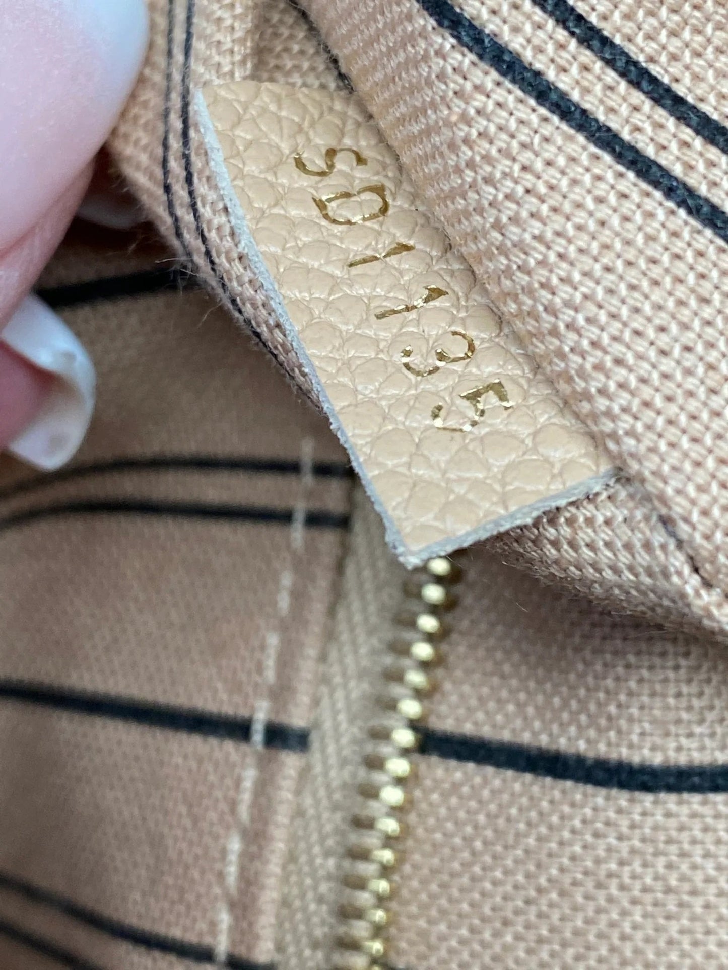 LOUIS VUITTON EMPREINTE BAGATELLE IN DUNE