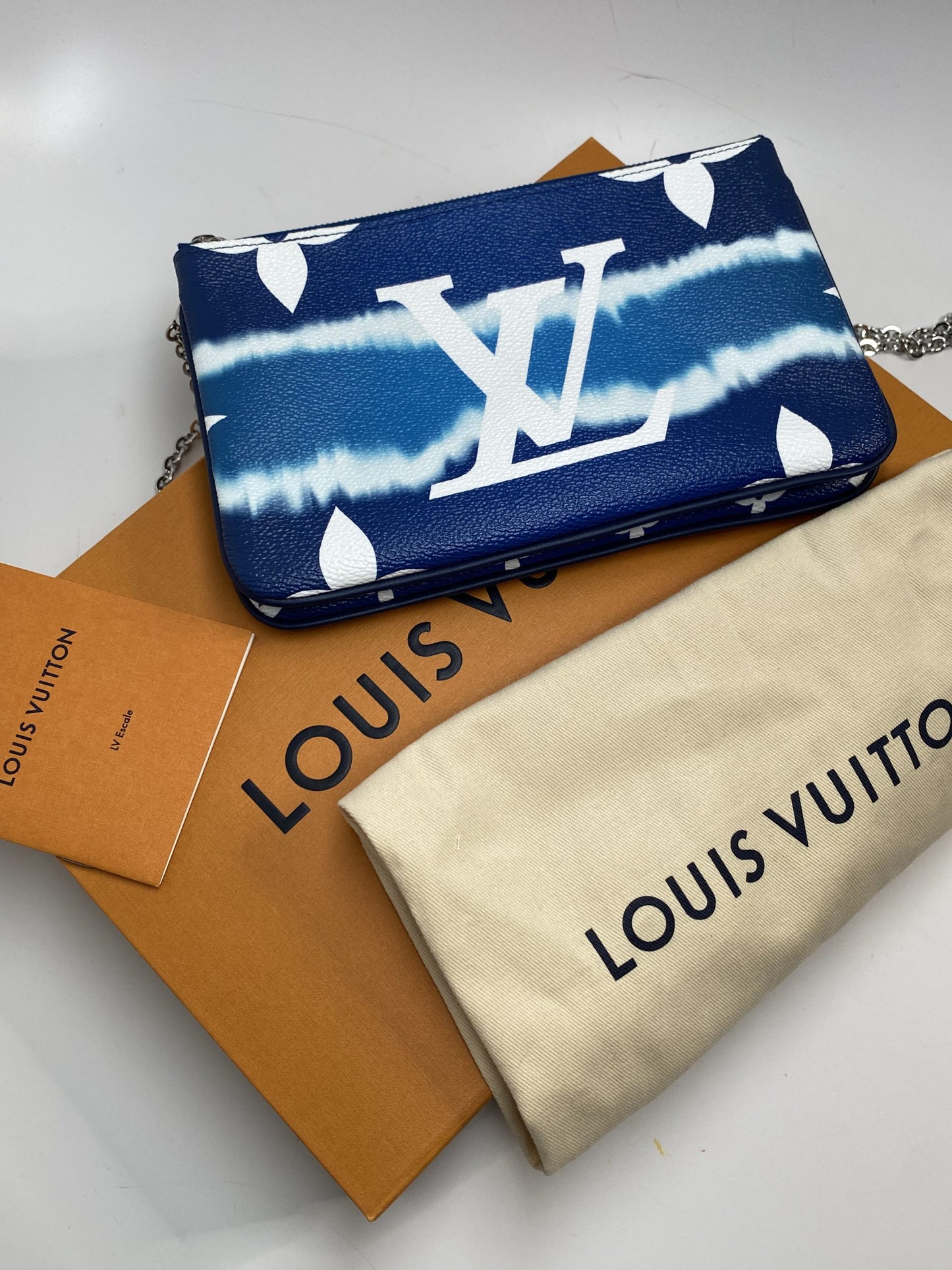 Louis Vuitton Pochette Mongoram Escale Double Zip