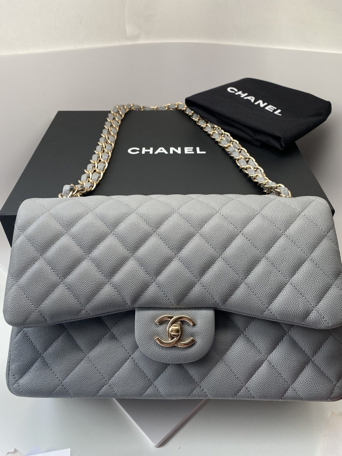 CHANEL LIGHT GRAY CAVIAR JUMBO CLASSIC DOUBLE FLAP BAG