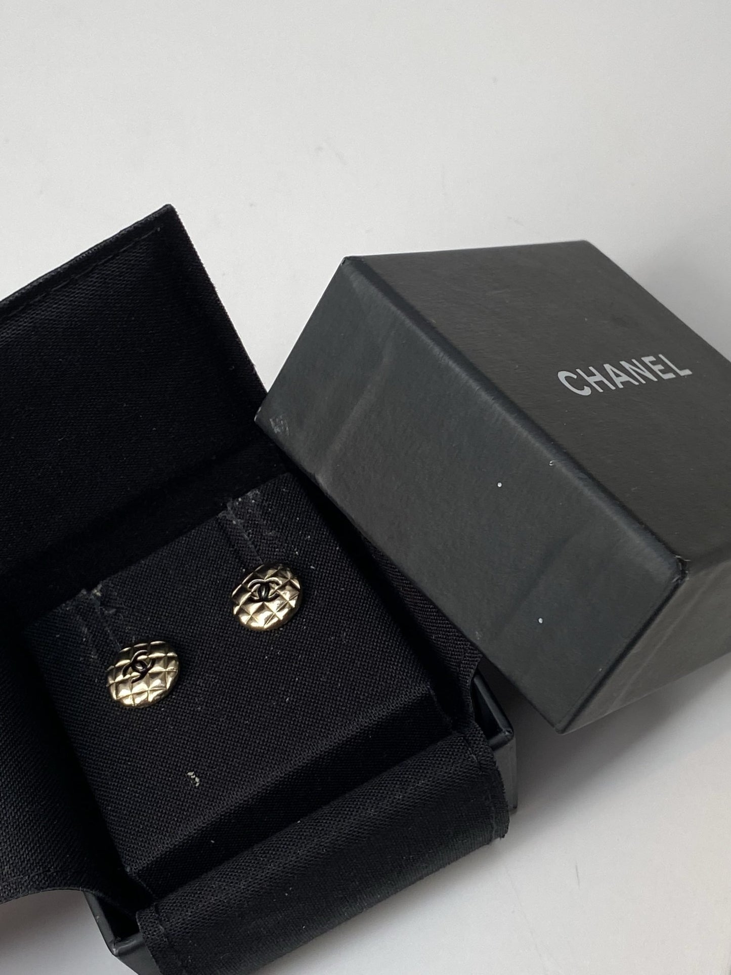 CHANEL VINTAGE METAL QUILTED PARIS BUTTON CC EARRINGS